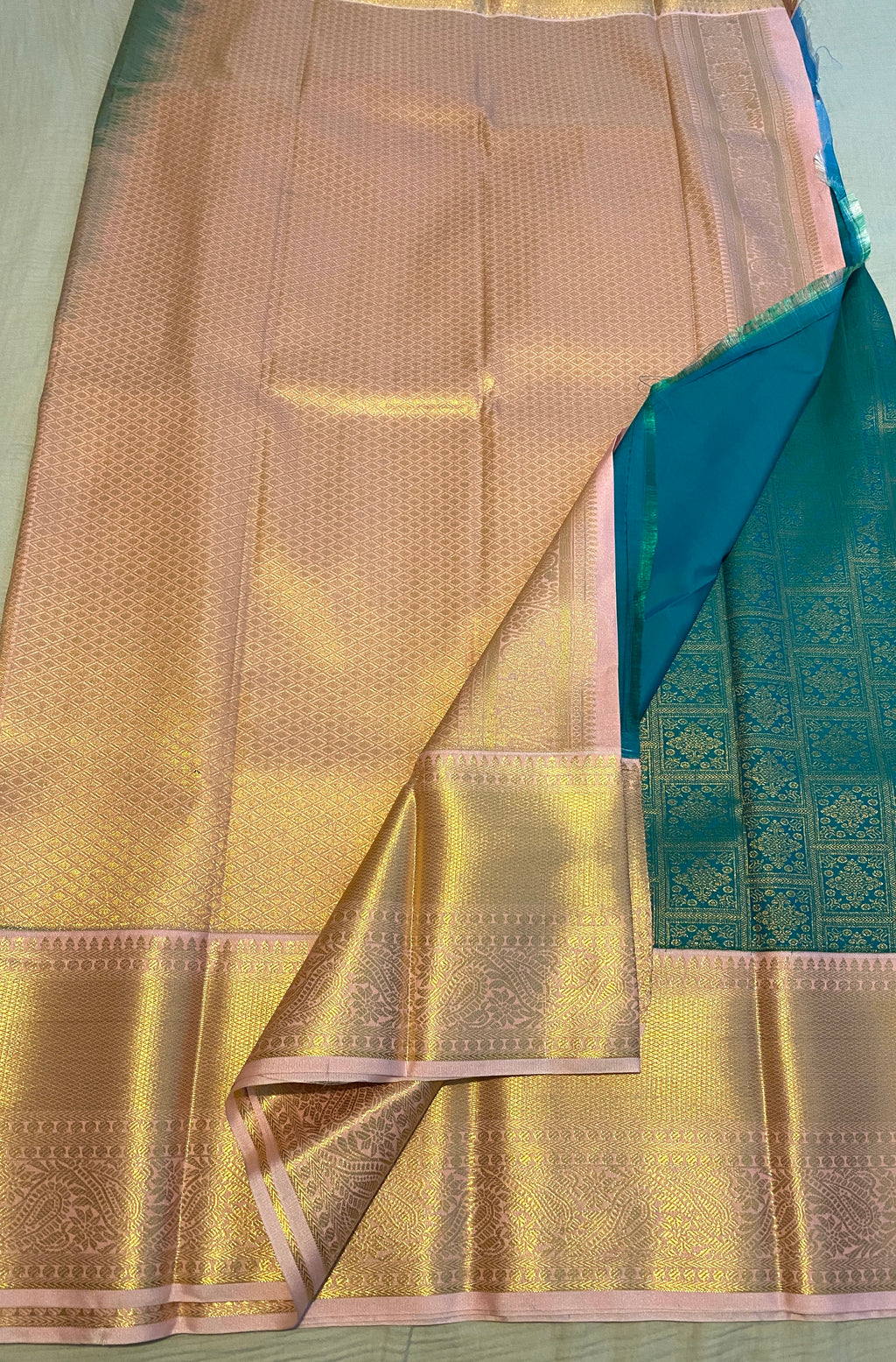 Emerald Green Semi-Kanchipuram Silk Saree with Baby Pink Zari Border & Woven Pallu