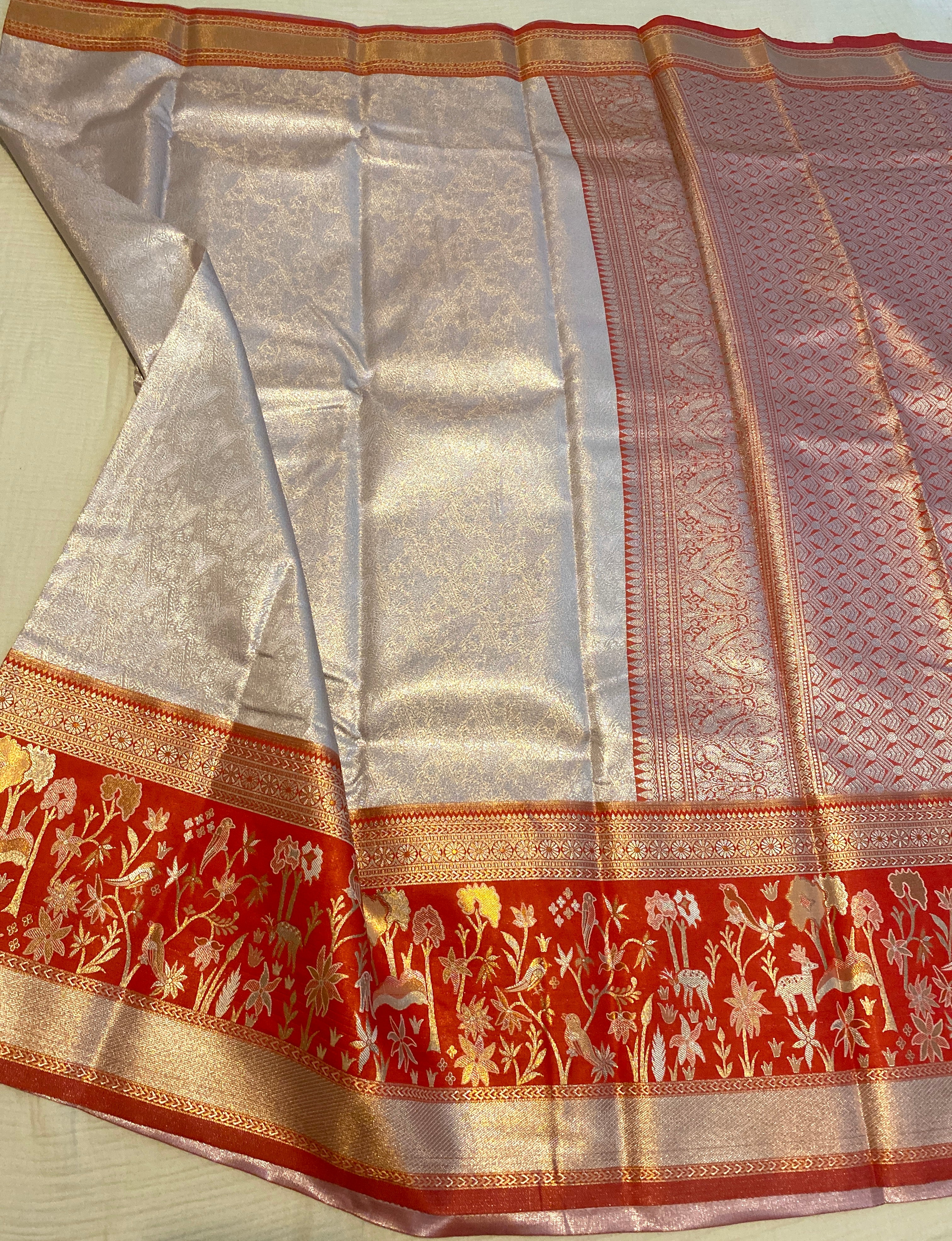 Light Peach Semi-Kanchipuram Silk Saree with Red Floral Zari Border