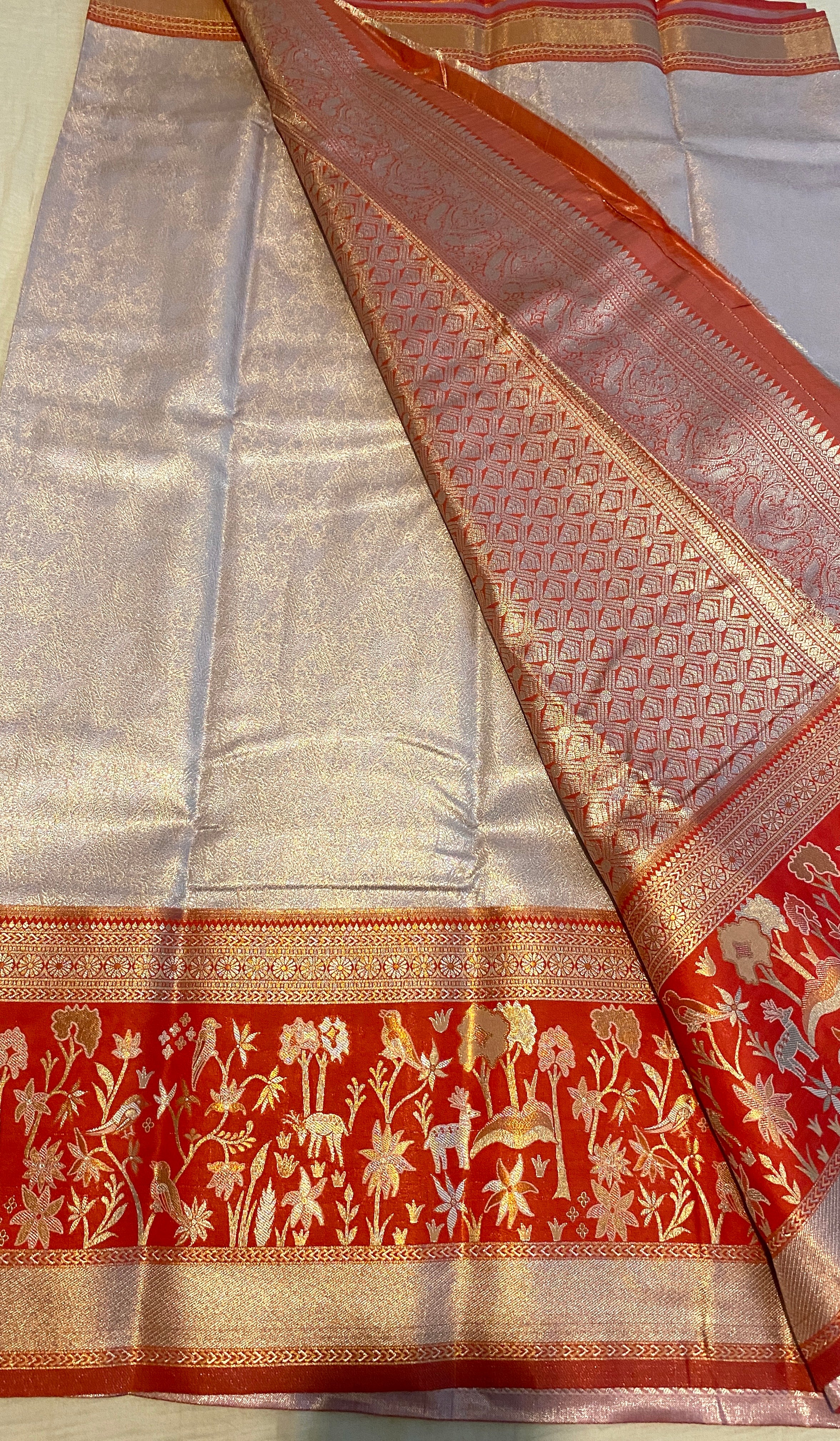 Light Peach Semi-Kanchipuram Silk Saree with Red Floral Zari Border