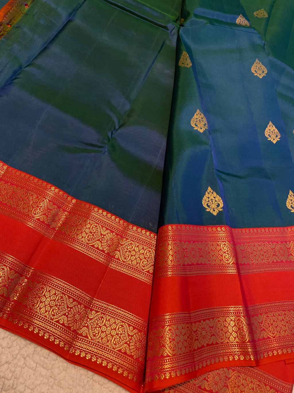 Pure Kanchipuram Silk Saree | Peacock Blue with Vibrant Reddish-Orange Zari Border