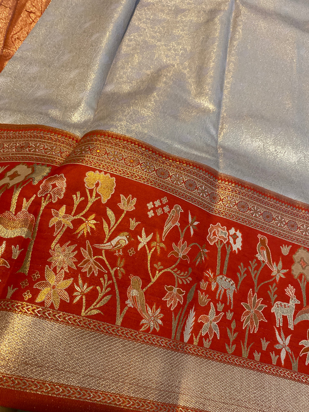 Light Peach Semi-Kanchipuram Silk Saree with Red Floral Zari Border