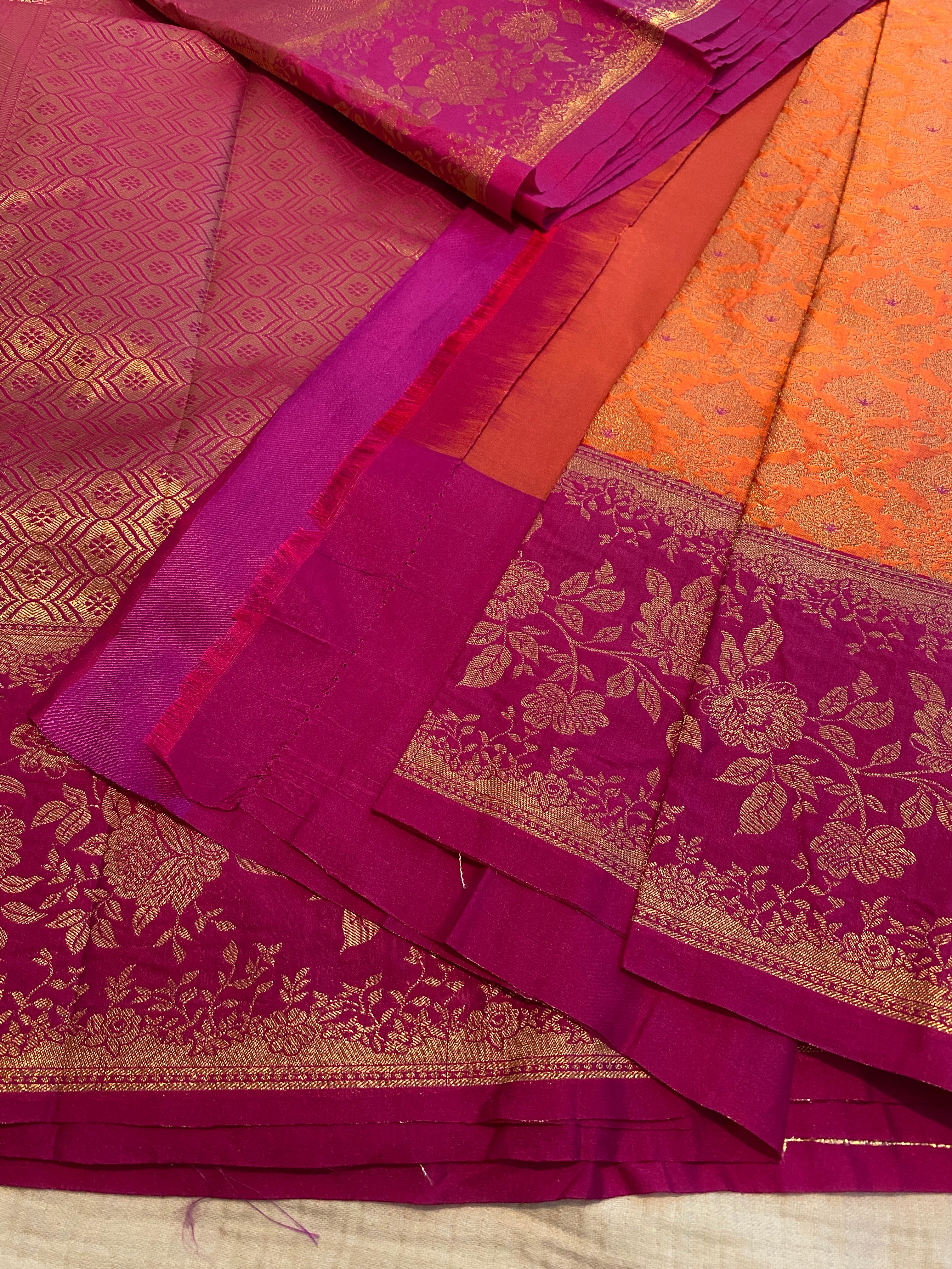 Premium Semi-Kanchipuram Silk Saree in Orange with Magenta Pink Floral Gold Zari Border & Pallu