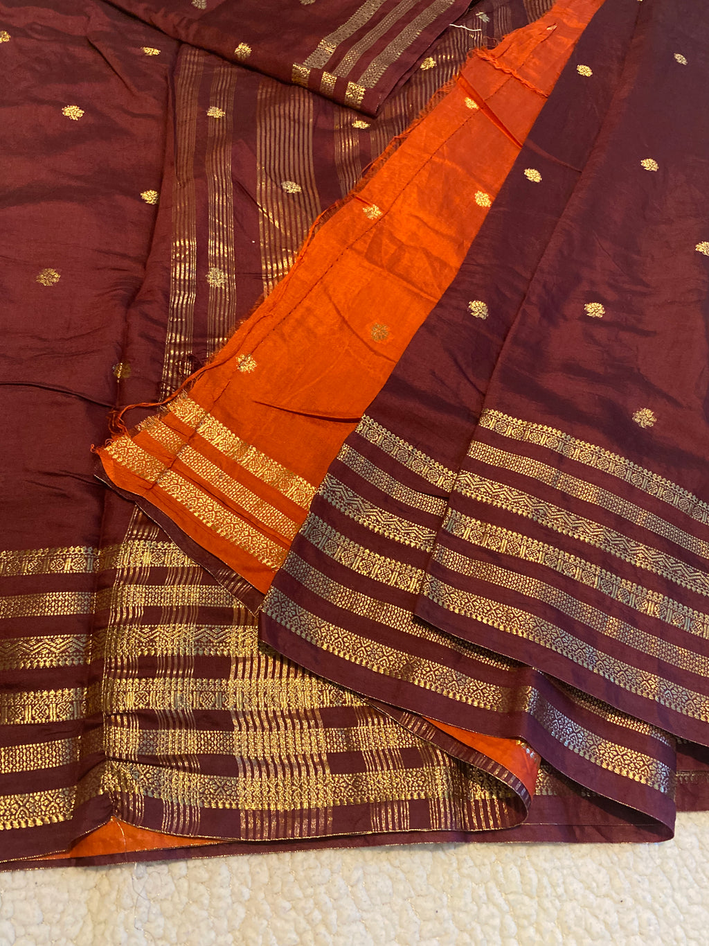 Rusty Maroon Assam Silk Saree with Gold Zari Border & Orange Blouse
