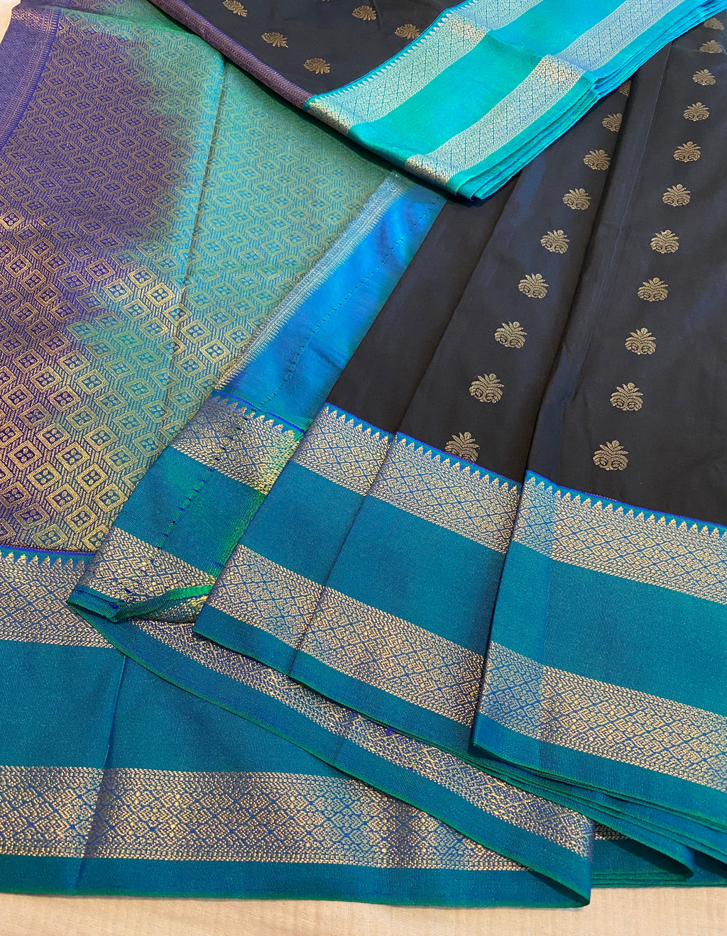 Black Premium Semi-Kanchipuram Silk Saree with Peacock Blue Zari Border & Gold Zari Motifs