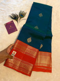 Pure Kanchipuram Silk Saree | Peacock Blue with Vibrant Reddish-Orange Zari Border