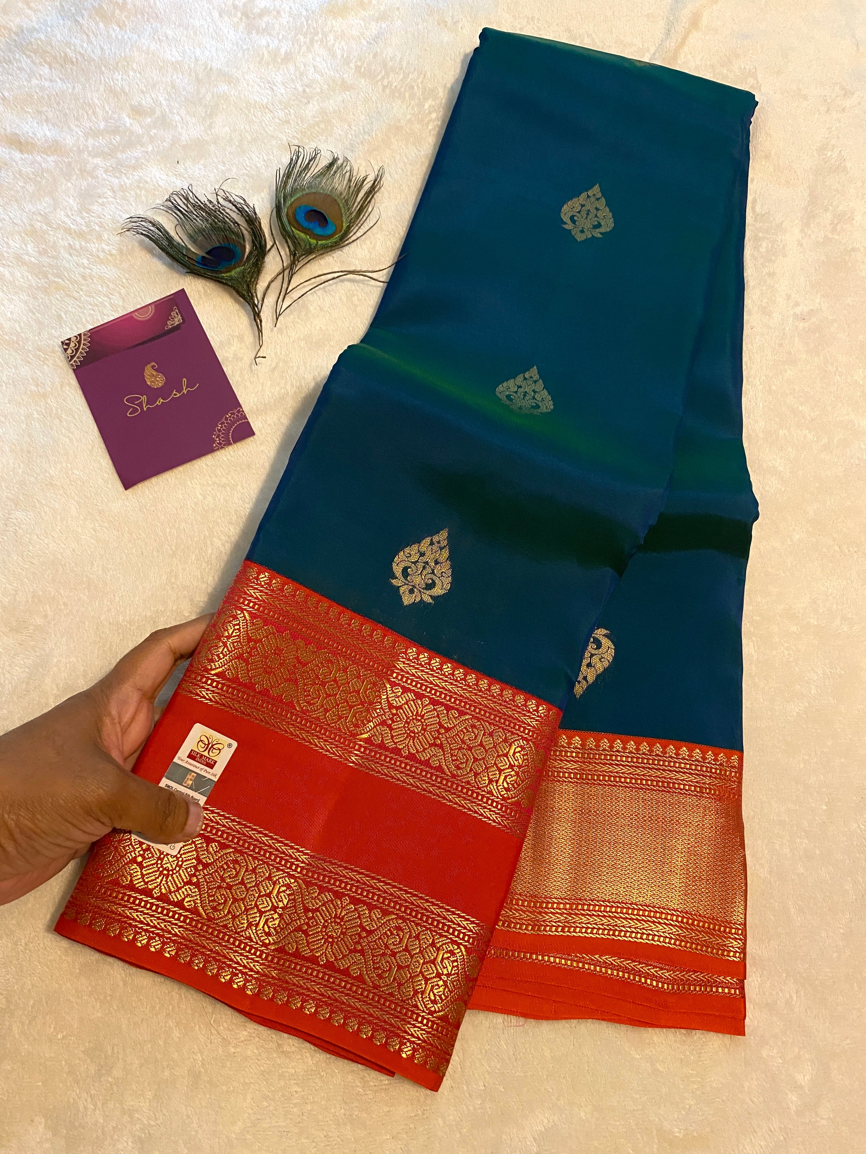 Pure Kanchipuram Silk Saree | Peacock Blue with Vibrant Reddish-Orange Zari Border