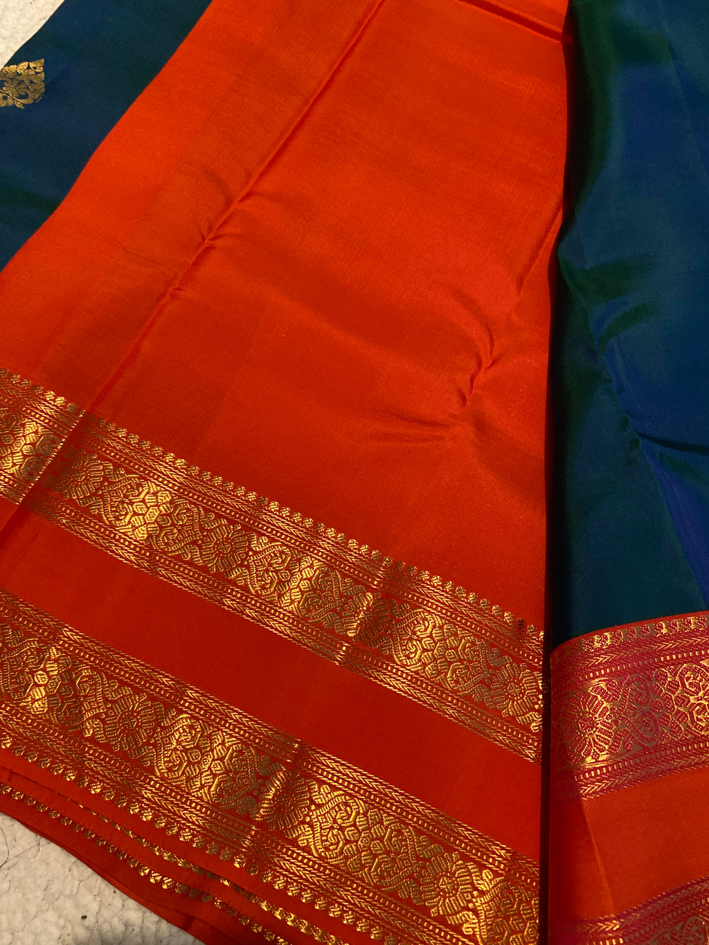 Pure Kanchipuram Silk Saree | Peacock Blue with Vibrant Reddish-Orange Zari Border