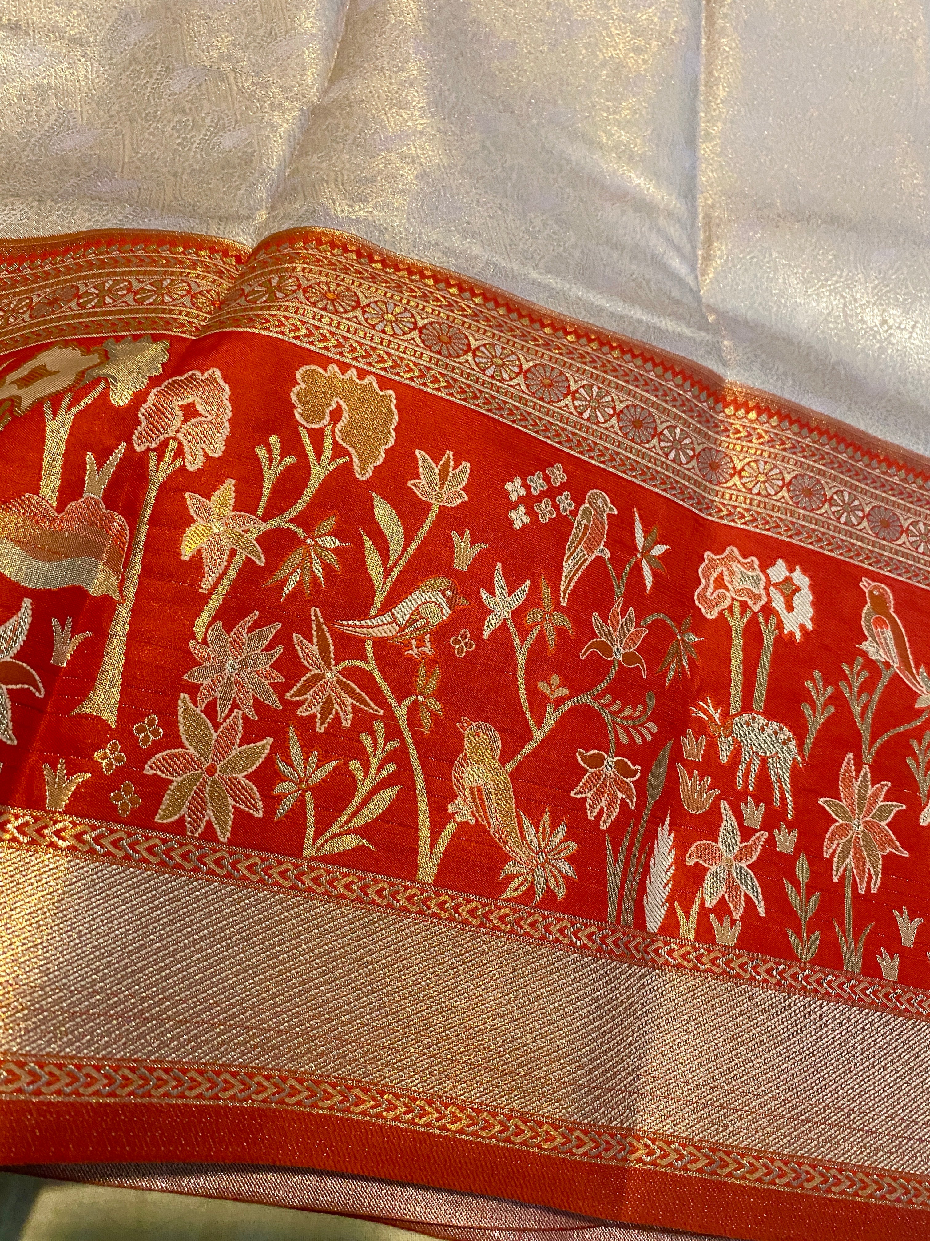 Light Peach Semi-Kanchipuram Silk Saree with Red Floral Zari Border
