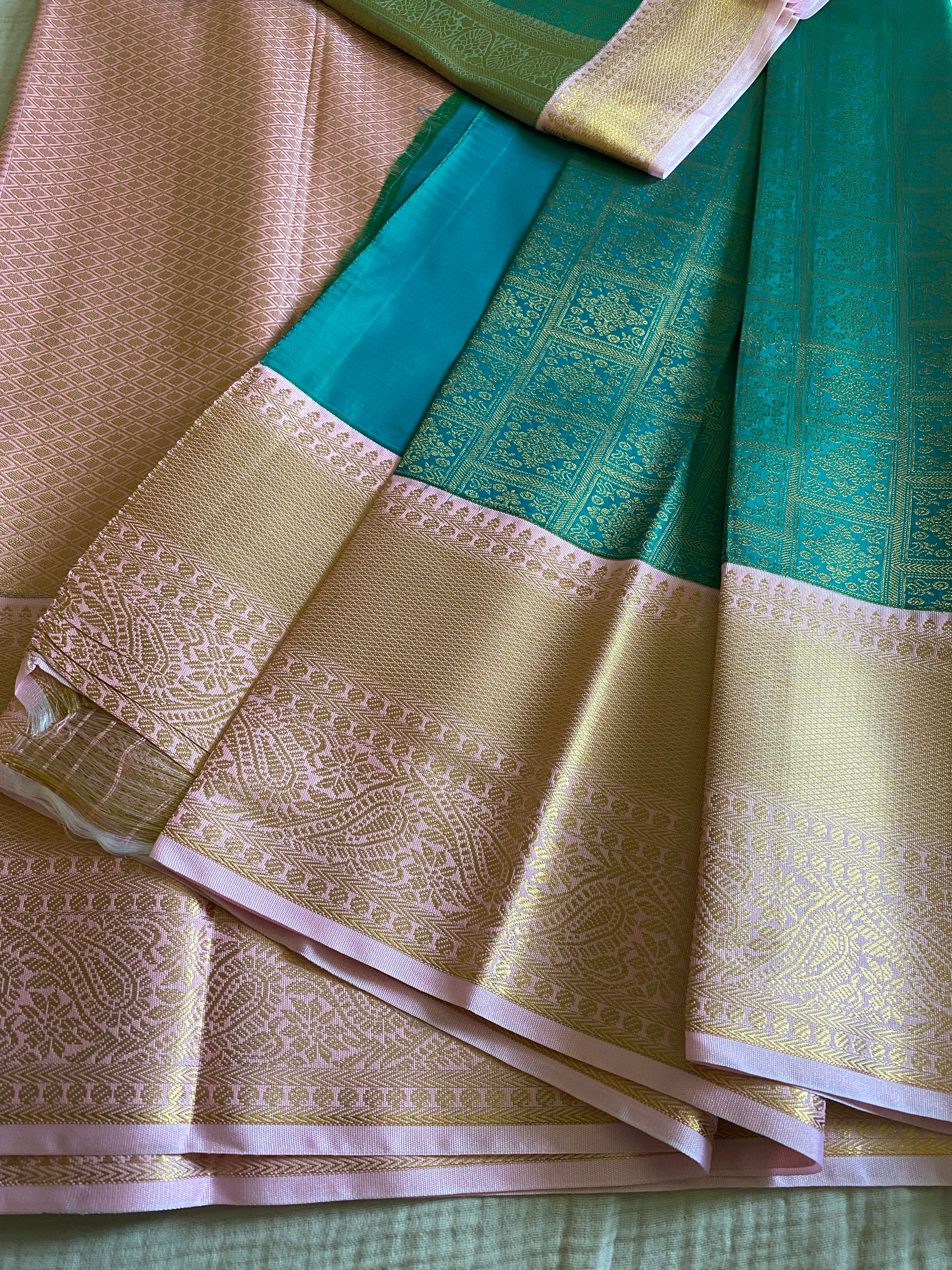 Emerald Green Semi-Kanchipuram Silk Saree with Baby Pink Zari Border & Woven Pallu