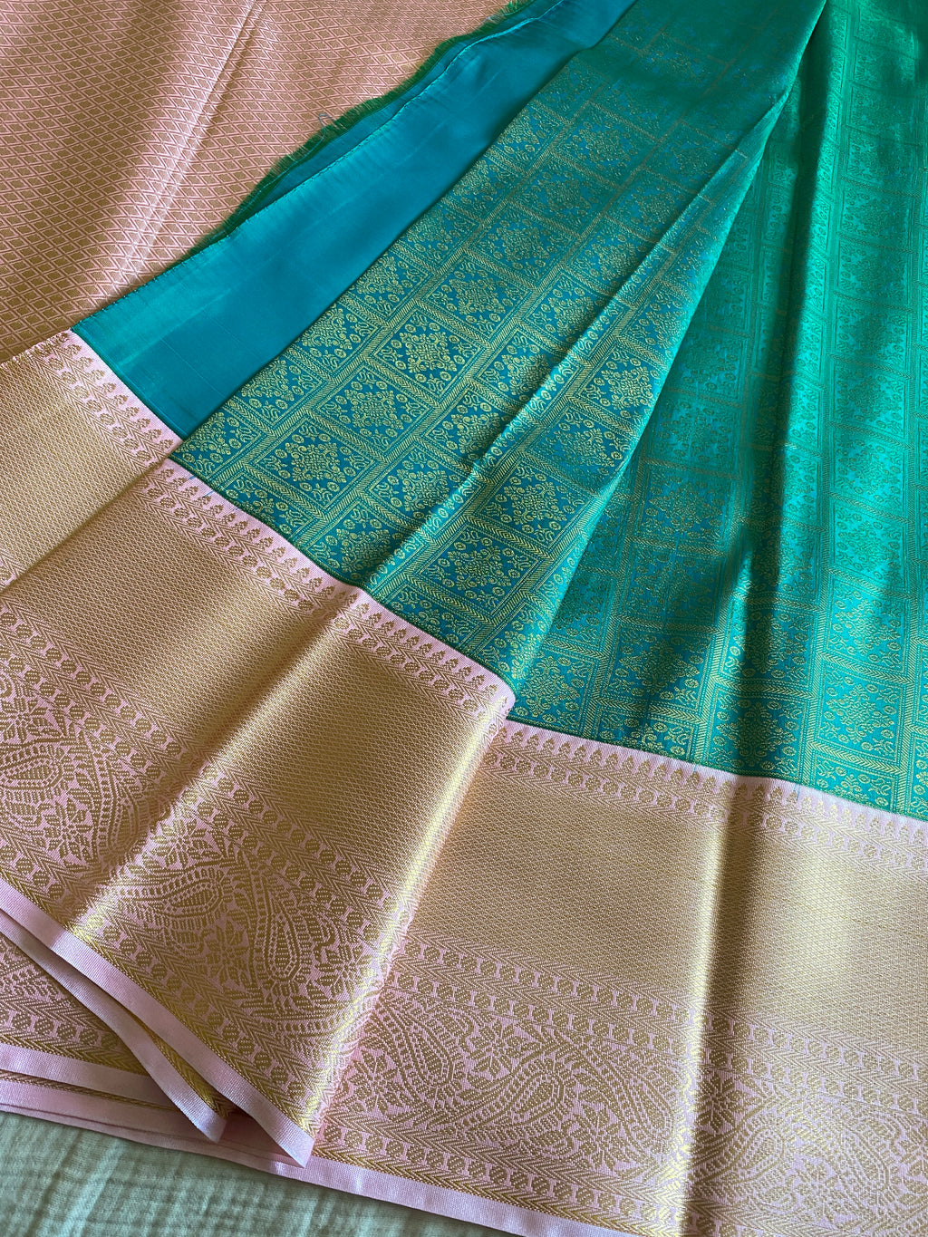 Emerald Green Semi-Kanchipuram Silk Saree with Baby Pink Zari Border & Woven Pallu