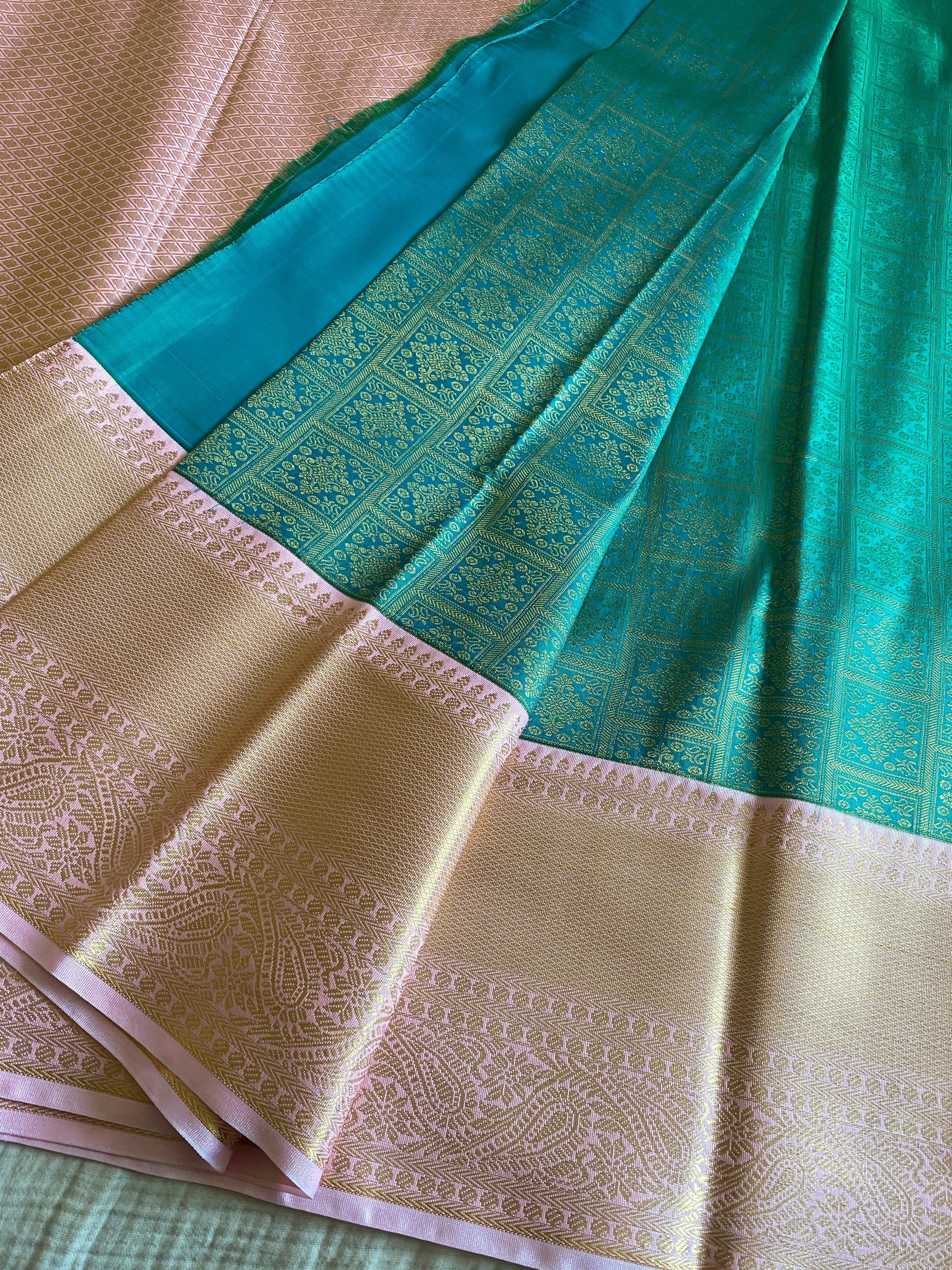 Emerald Green Semi-Kanchipuram Silk Saree with Baby Pink Zari Border & Woven Pallu