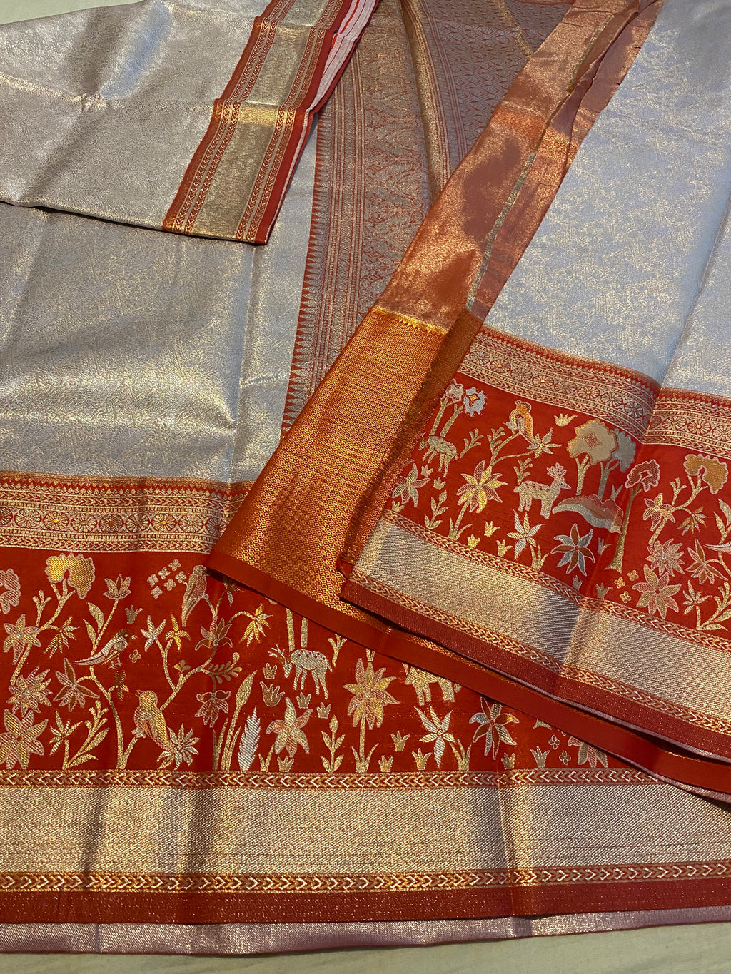 Light Peach Semi-Kanchipuram Silk Saree with Red Floral Zari Border