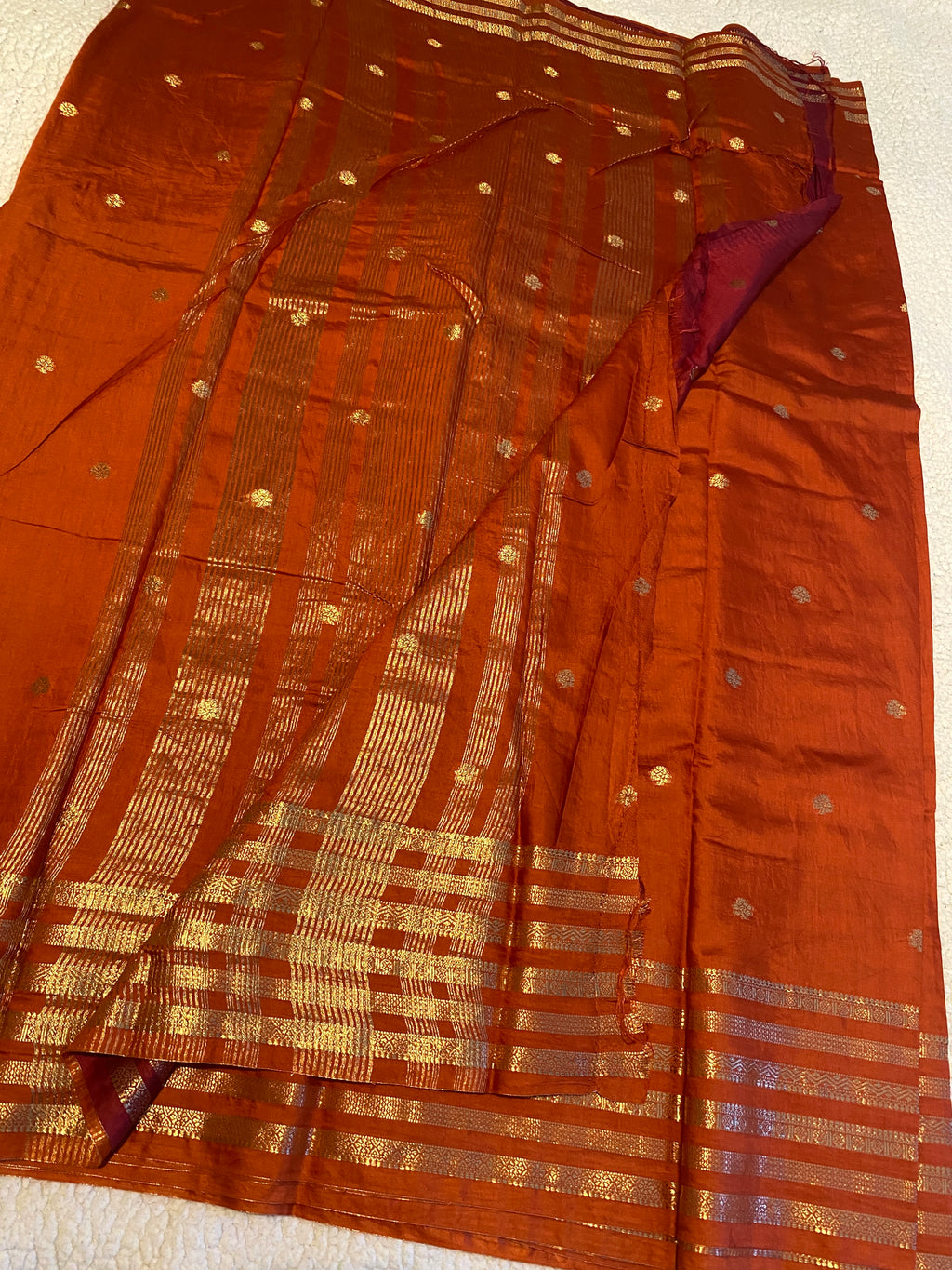 Assam Silk Saree in Burnt Orange with Gold Zari Border & Contrast Deep Reddish Maroon Blouse