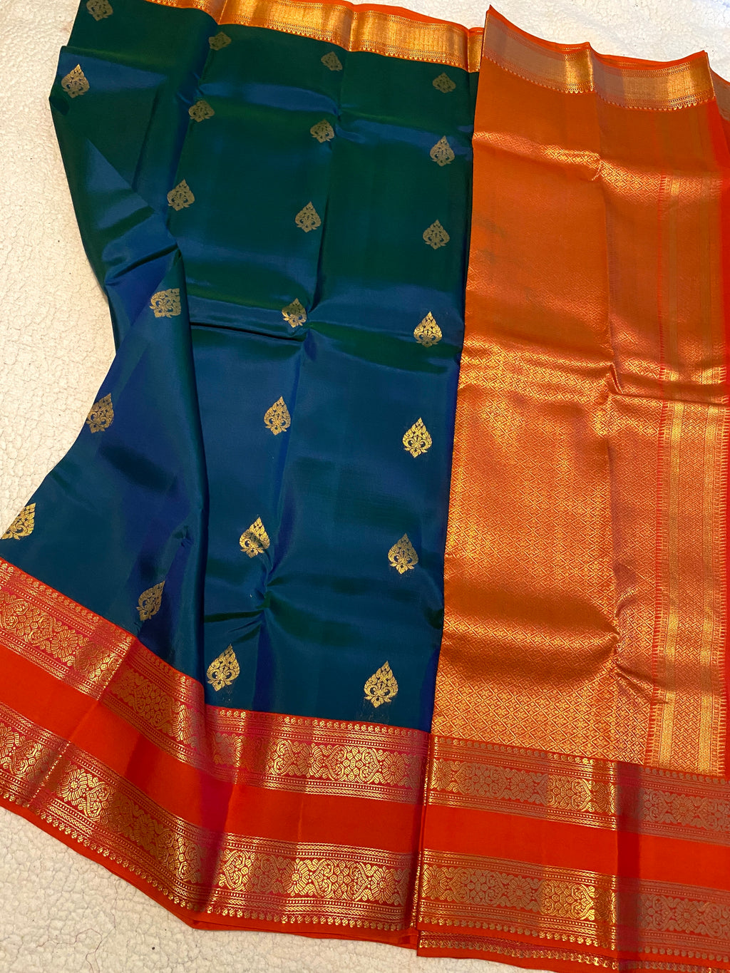 Pure Kanchipuram Silk Saree | Peacock Blue with Vibrant Reddish-Orange Zari Border