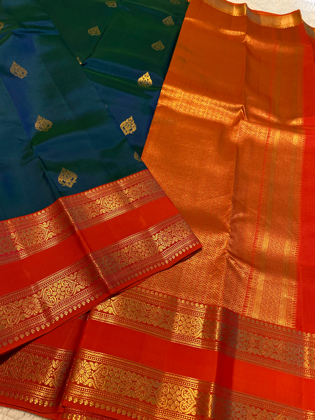 Pure Kanchipuram Silk Saree | Peacock Blue with Vibrant Reddish-Orange Zari Border