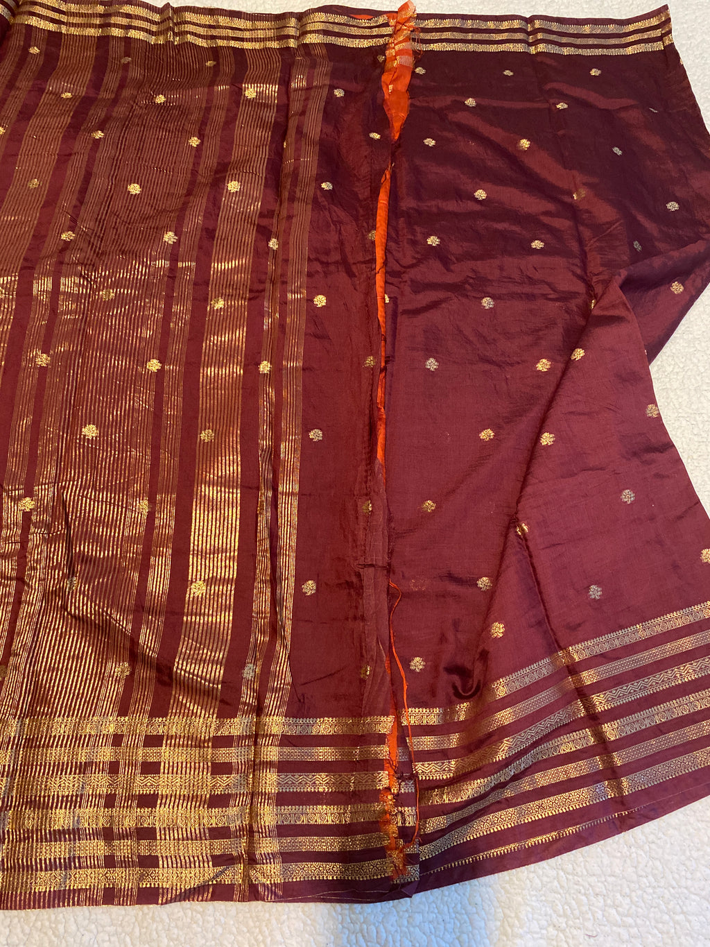 Rusty Maroon Assam Silk Saree with Gold Zari Border & Orange Blouse