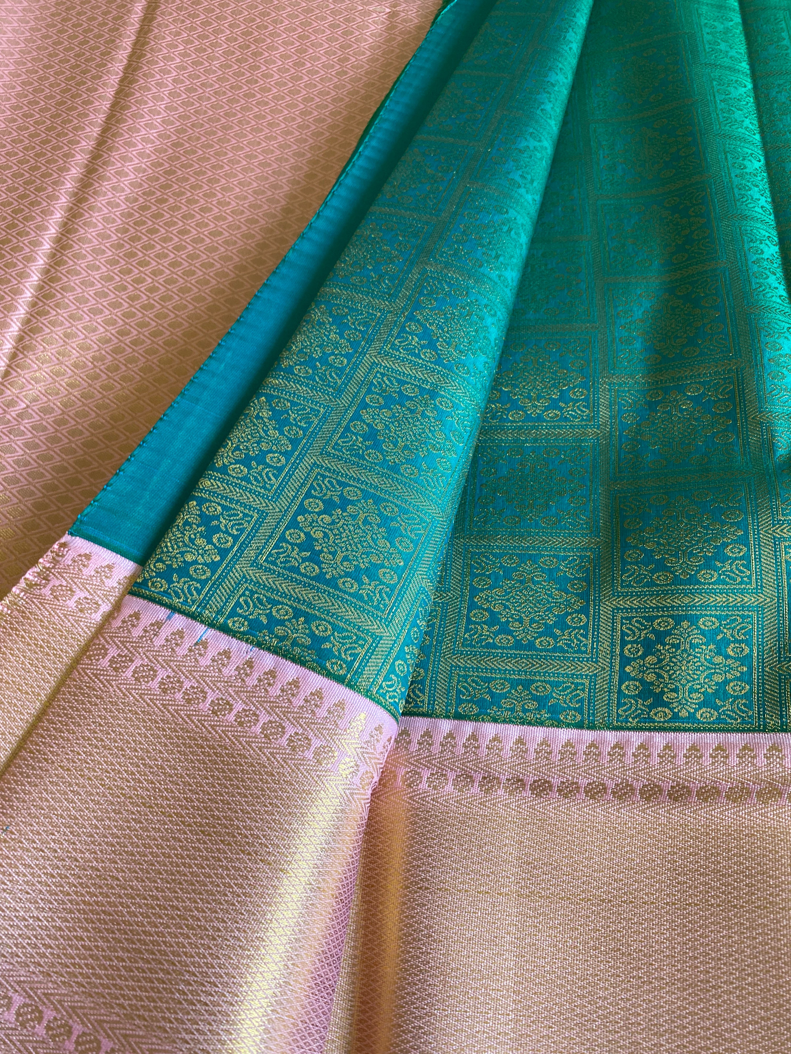 Emerald Green Semi-Kanchipuram Silk Saree with Baby Pink Zari Border & Woven Pallu
