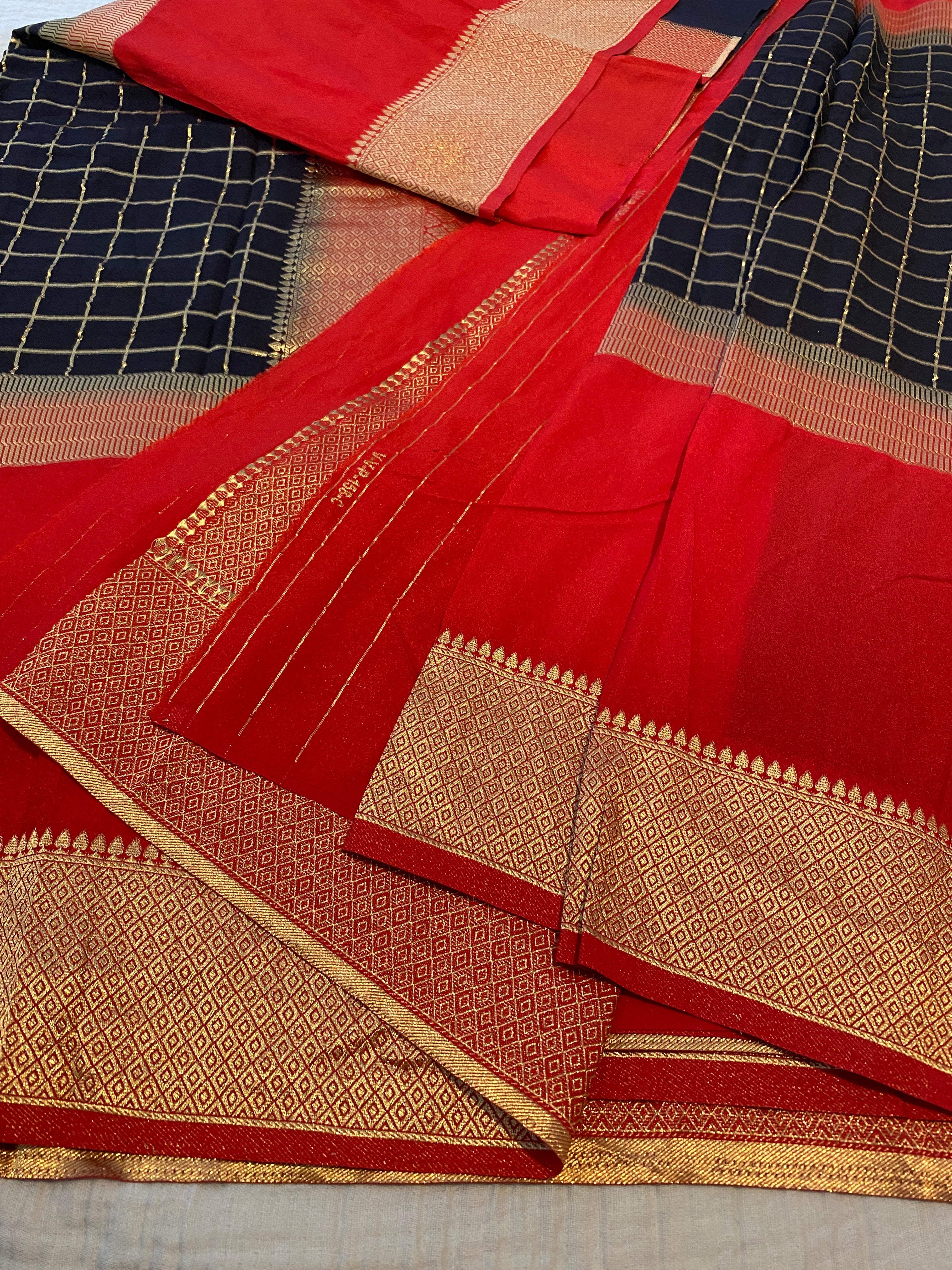 Georgette Saree in Black & Red with Gold Zari Checks