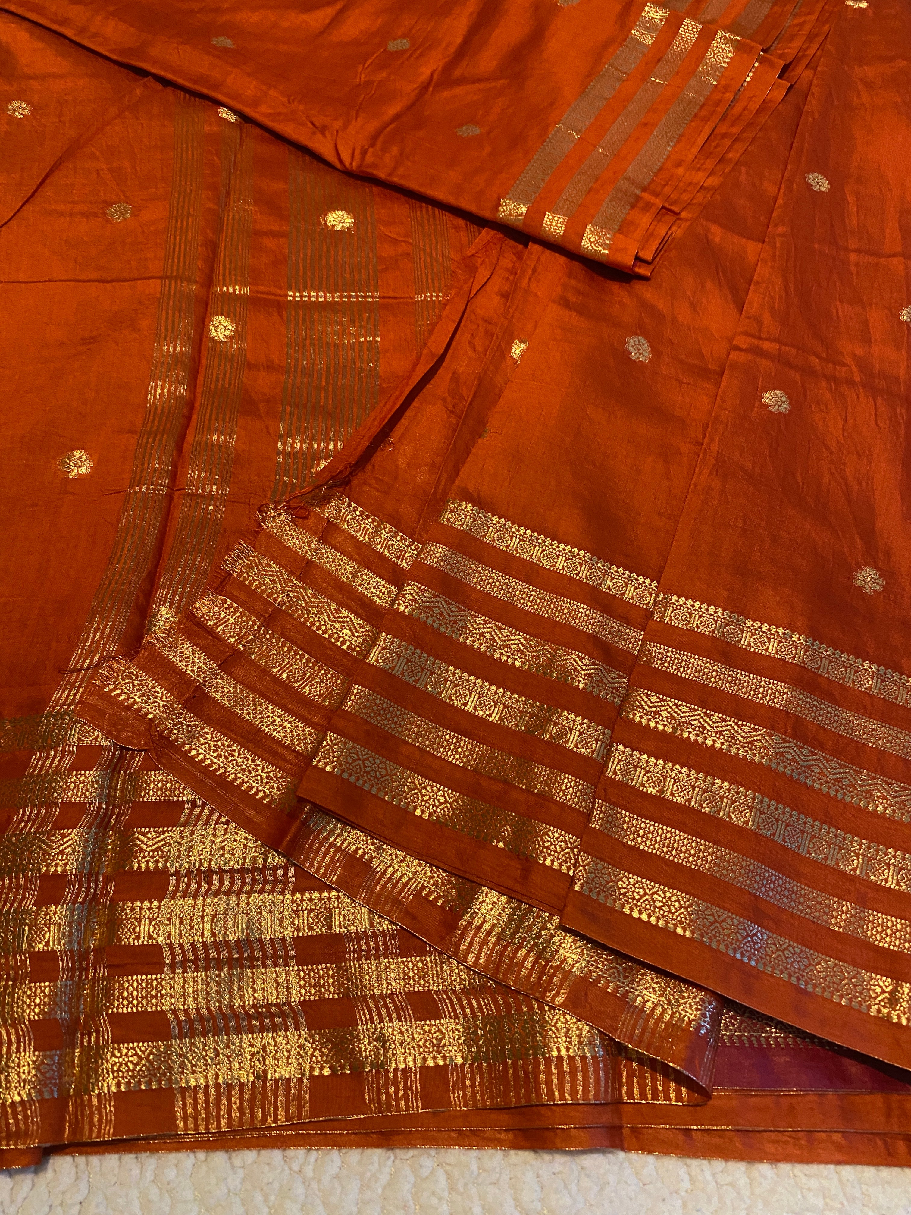 Assam Silk Saree in Burnt Orange with Gold Zari Border & Contrast Deep Reddish Maroon Blouse