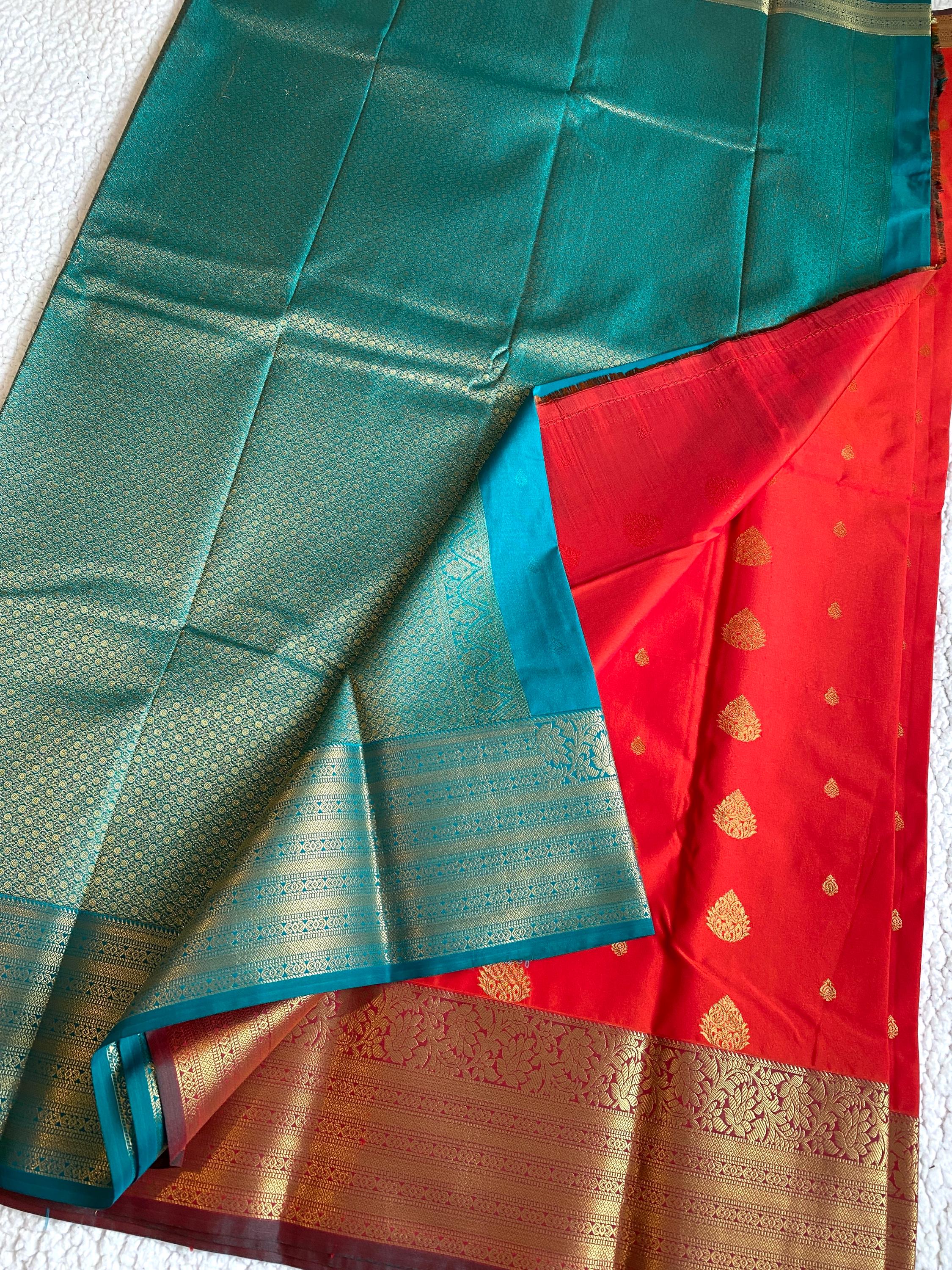 Semi-Kanchipuram Silk Saree – Vibrant Orange with Teal Green Pallu
