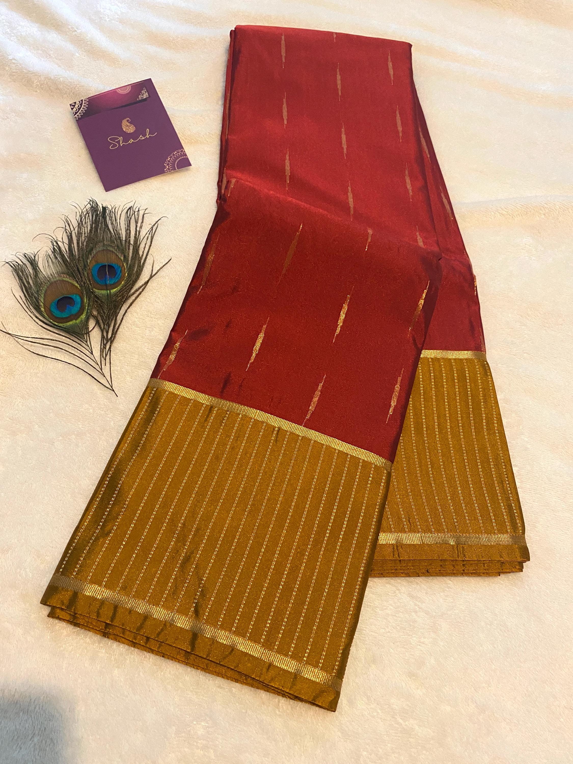 Elegant Reddish Maroon Semi-Kanchipuram Silk Saree with Mustard Pallu & Gold Zari Border