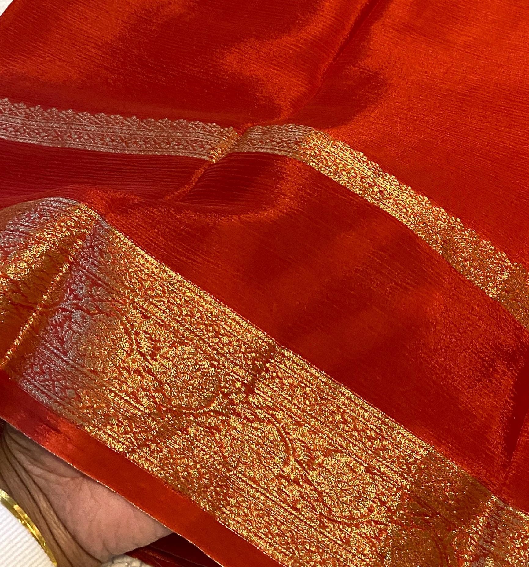 Reddish Orange Satin Crush Saree with Floral Blouse