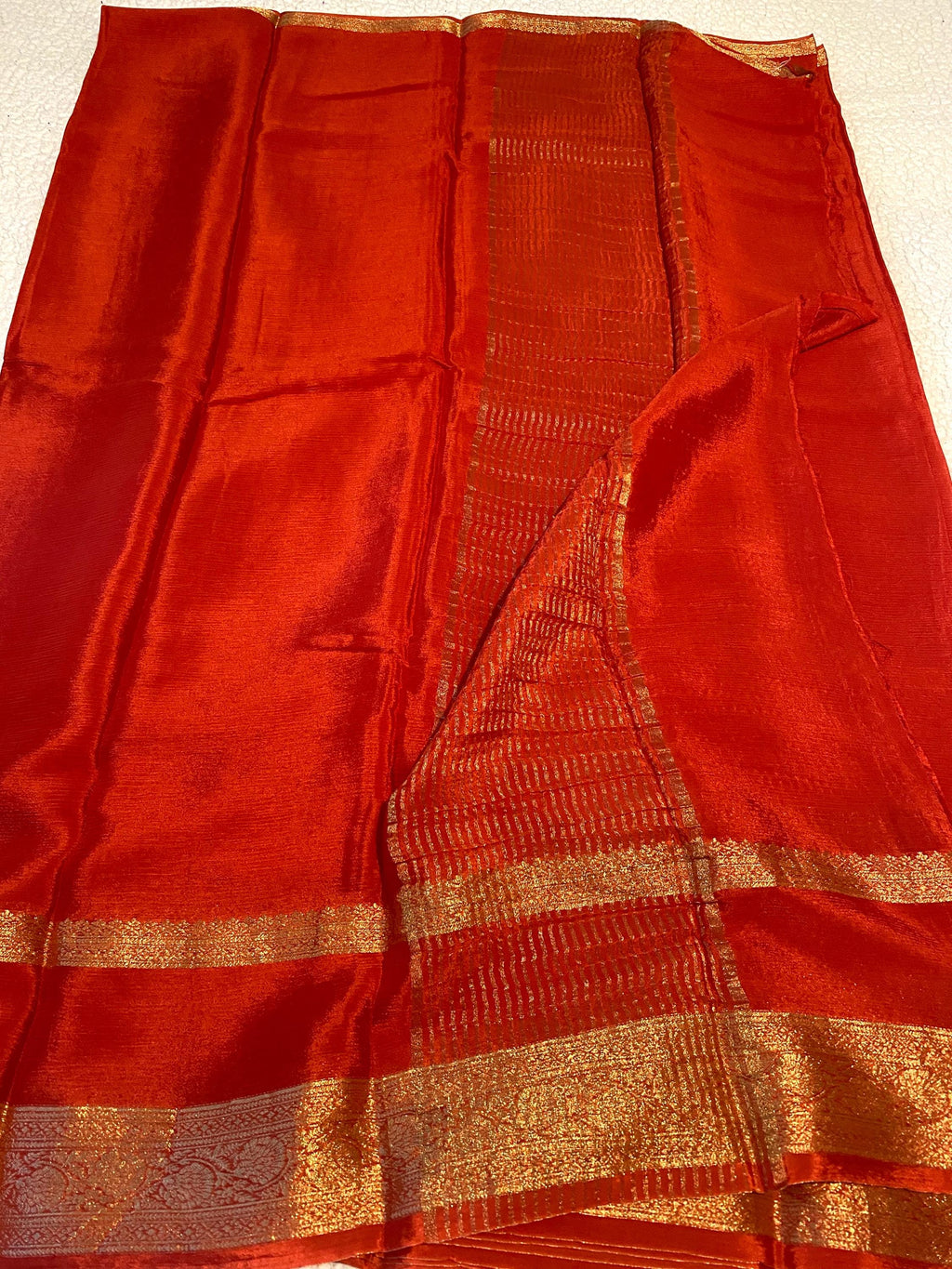 Reddish Orange Satin Crush Saree with Floral Blouse