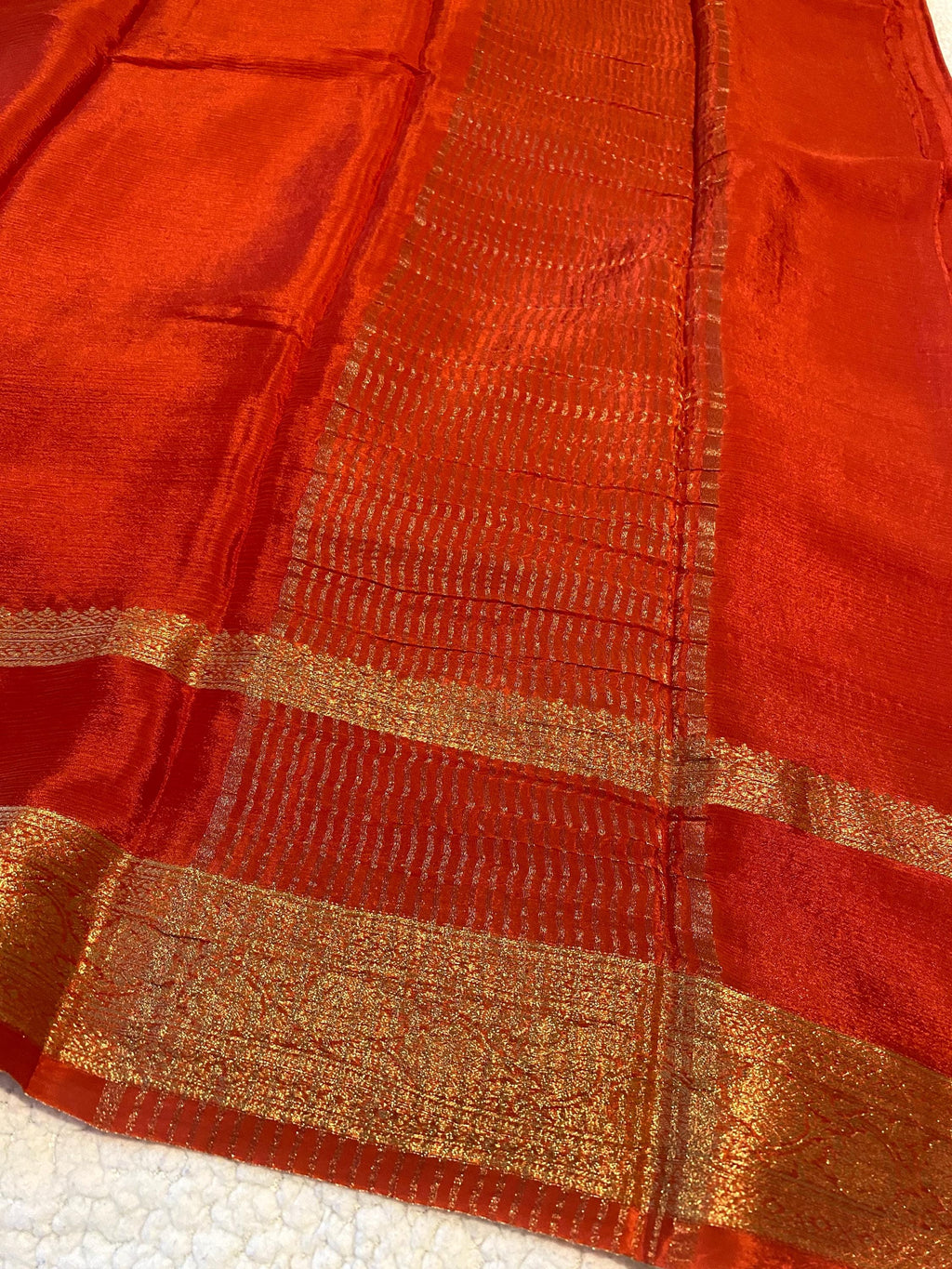 Reddish Orange Satin Crush Saree with Floral Blouse