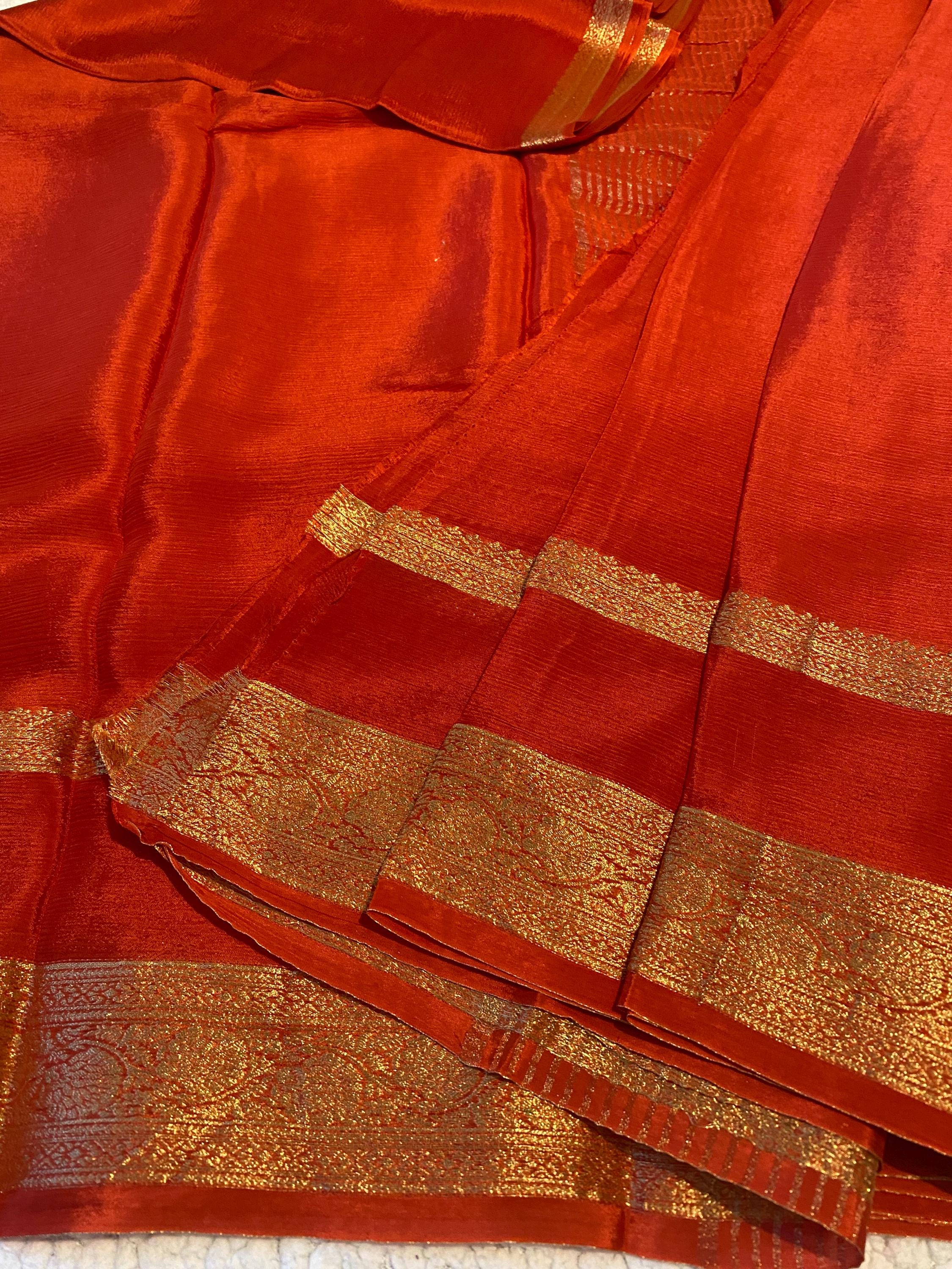 Reddish Orange Satin Crush Saree with Floral Blouse