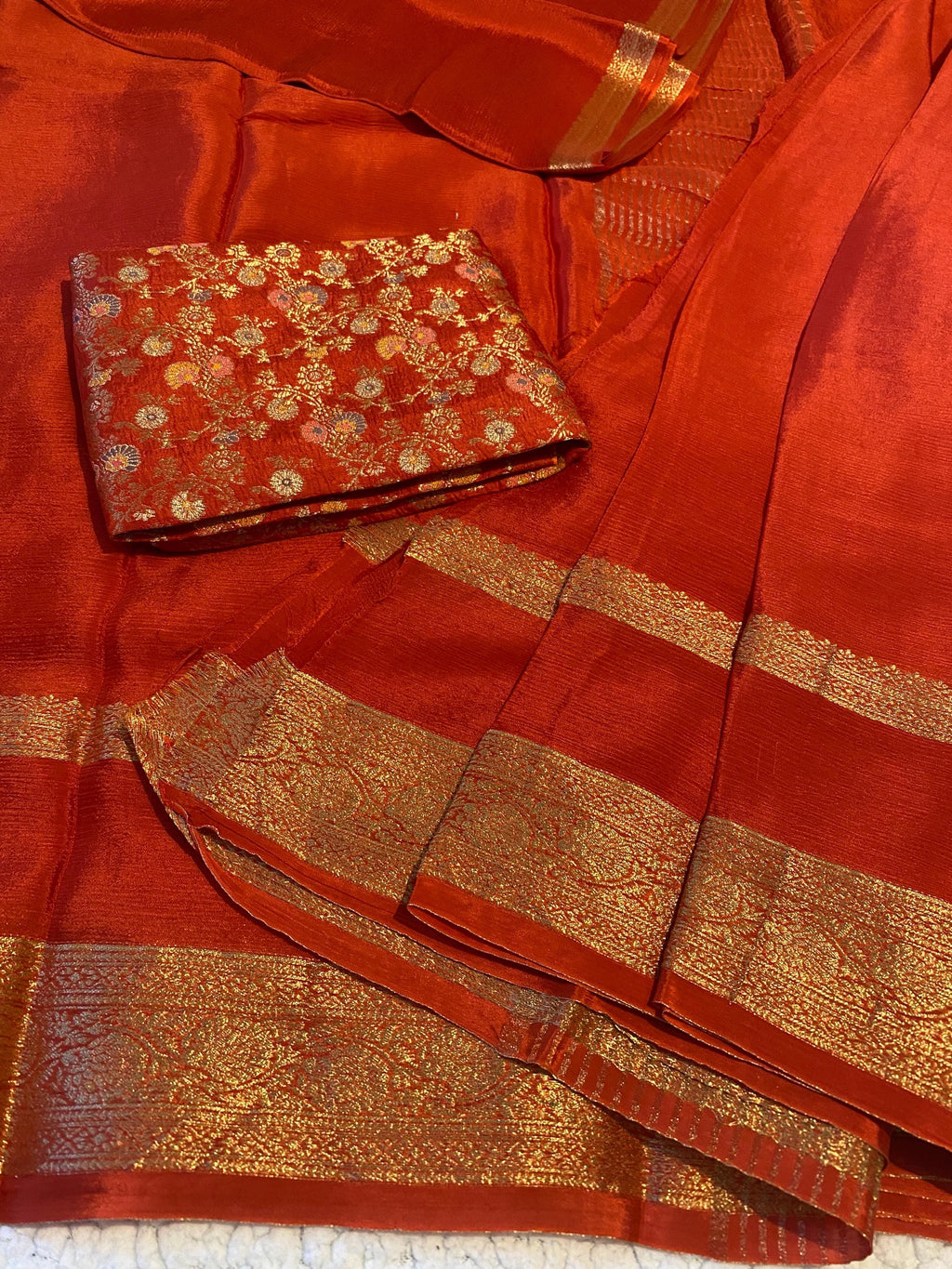 Reddish Orange Satin Crush Saree with Floral Blouse