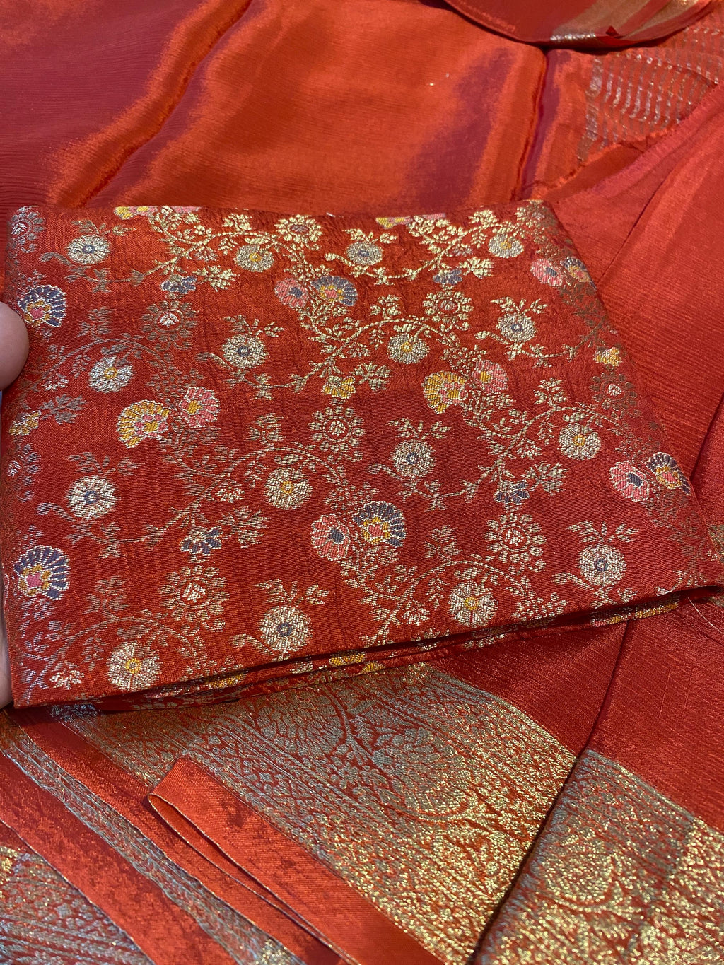 Reddish Orange Satin Crush Saree with Floral Blouse